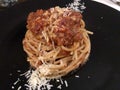 Pasta Bolognese with cheese . Close up.