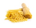 Spaghetti, mafaldine and macaroni pasta. Uncooked italian pasta isolated on white background Royalty Free Stock Photo