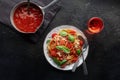 Spaghetti marinara, pasta with tomato sauce and basil, overhead flat lay shot Royalty Free Stock Photo