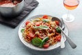 Spaghetti marinara, pasta with tomato sauce and basil, with wine Royalty Free Stock Photo