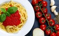 Spaghetti with marinara sauce and basil leaves on top, decorated Royalty Free Stock Photo