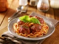 Spaghetti and meatballs dinner with basil garnish Royalty Free Stock Photo