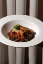 Spaghetti nero with prawns and mussels