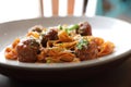 Spaghetti pasta with beef meatballs and tomato sauce on a dish , italian food Royalty Free Stock Photo