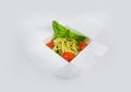 Spaghetti Pasta in Caprese style in white delivery box isolated on gray background. Royalty Free Stock Photo