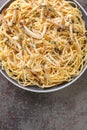 Spaghetti pasta with creamy mushroom sauce, cheese and thyme closeup on plate. Vertical top view Royalty Free Stock Photo