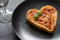 Spaghetti pasta heart love italian food diet abstract concept on black background Royalty Free Stock Photo