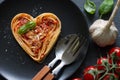 Spaghetti pasta heart love italian food diet abstract concept on black background Royalty Free Stock Photo