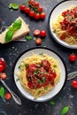 Spaghetti pasta meatballs with tomato sauce, basil, herbs parmesan cheese on dark background Royalty Free Stock Photo