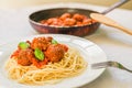 Spaghetti pasta with meatballs in tomato sauce and basil leaves Royalty Free Stock Photo