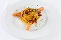 Spaghetti pasta with prawns and tomatoes. Gourmet restaurant seafood