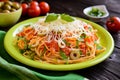 Spaghetti pasta salad with tomato sauce, olives, Gouda cheese and basil Royalty Free Stock Photo