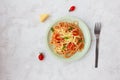 Spaghetti pasta with sauce and cheese, top view. Royalty Free Stock Photo