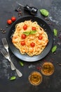 Spaghetti pasta with shrimps and white wine on a dark stone background. Top view Royalty Free Stock Photo