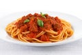 Spaghetti pasta with tomato beef sauce in plate, cut out on white background Royalty Free Stock Photo