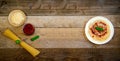 Spaghetti Pasta with Tomato Sauce, Cheese and Basil on Wooden Table. Traditional Italian Food. Royalty Free Stock Photo