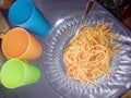 Spaghetti plate fork three plastic glasses