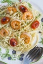 Spaghetti with prawns and grape tomatoes