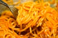 Spaghetti rolled on fork with Tomato Sauce, Italian Food Close-Up Royalty Free Stock Photo