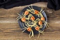 spaghetti with sausages in the form of spiders. Happy kid food for Halloween party. Top view with copyspace Royalty Free Stock Photo