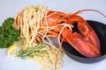 Spaghetti seafood lobster food on a white plate with herb spices lemon rosemary served table in the restaurant gourmet food Royalty Free Stock Photo