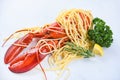 Spaghetti seafood lobster food on a white plate with herb spices lemon rosemary served table in the restaurant gourmet food Royalty Free Stock Photo