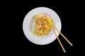 Spaghetti shrimp in white dish, top view noodles spicy with seafood isolated on black background - Clipping Path, Top views