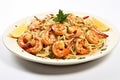 Spaghetti with shrimps, lemon and parsley on white plate isolate on white background Royalty Free Stock Photo