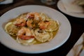 Spaghetti with shrimps,tomato and chopped parsley Royalty Free Stock Photo