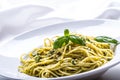 Spaghetti. Spaghetti with homemade pesto sauce olive oil and basil leaves Royalty Free Stock Photo