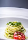 Spaghetti. Spaghetti with homemade pesto sauce olive oil and basil leaves Royalty Free Stock Photo