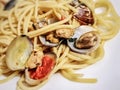 Spaghetti with tiny baby clams in the shell. Royalty Free Stock Photo