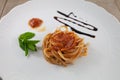 Spaghetti with tomato basil and mint typical Italian dish Royalty Free Stock Photo