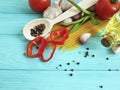 Spaghetti, tomato, garlic dinner frame healthy a blue wooden background cooking