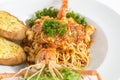 Spaghetti tomato sauce with big freshwater prawn serve with garlic bread