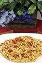 Spaghetti with Tomatoes and Flowers Royalty Free Stock Photo