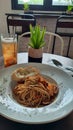 Spaghetti tuna aglio olio with bread garlic