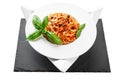 Spaghetti tuna pasta basil plate triangle shape slate table pretty Royalty Free Stock Photo