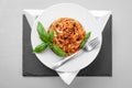 Spaghetti tuna pasta basil plate triangle shape slate table pretty Royalty Free Stock Photo