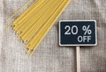 Spaghetti uncooked and sale 20 percent off drawing on blackboard Royalty Free Stock Photo