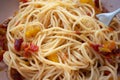 Spaghetti with vegetable sauce, vegan food. Italian pasta with chopped sweet paprika, herbs and spices, close-up. Vegetarian Royalty Free Stock Photo