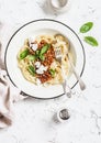 Spaghetti with vegetarian lentil bolognese on a light background. Royalty Free Stock Photo