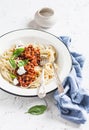 Spaghetti with vegetarian lentil bolognese on a light background. Royalty Free Stock Photo