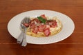 Spaghetti white cream sauce on white plate