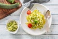 Spaghetti zucchini raw vegan pasta with feta cheese cucumber and basil