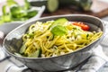 Spaghetti zucchini raw vegan pasta with feta cheese cucumber and basil