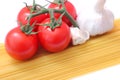 Spaghettis, tomatoes and onions Royalty Free Stock Photo