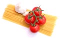 Spaghettis, tomatoes and onions Royalty Free Stock Photo