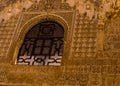 Spain, Andalusia, Alhambra, Moorish, black lattice window in carved wall intricate design
