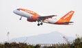 SPAIN, BARCELONA - AUGUST 8, 2023: Easyjet airplane takes off from Barcelona